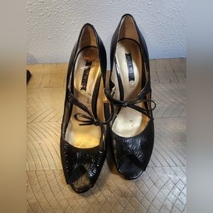 Nine West black pumps with cute bow accent, size 8 1/2